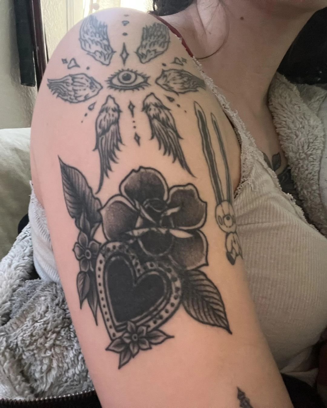 The Meaning Behind Floral Anatomical Heart Tattoos