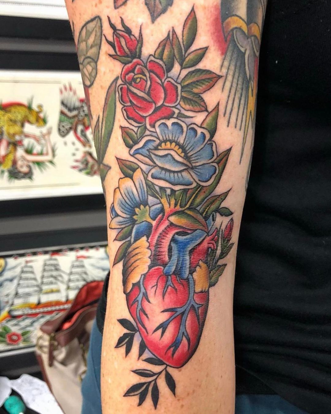 The Meaning Behind Floral Anatomical Heart Tattoos