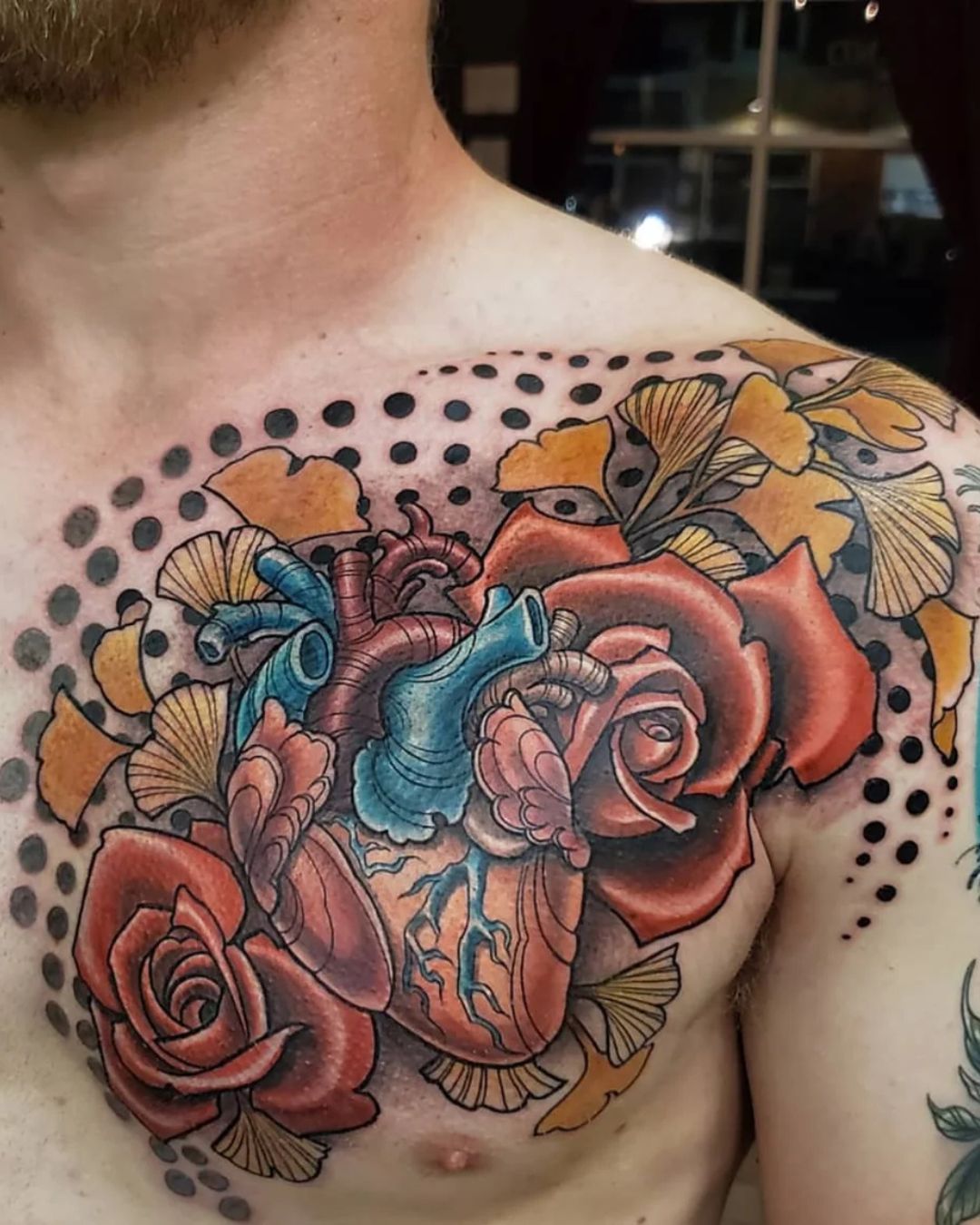 The Meaning Behind Floral Anatomical Heart Tattoos
