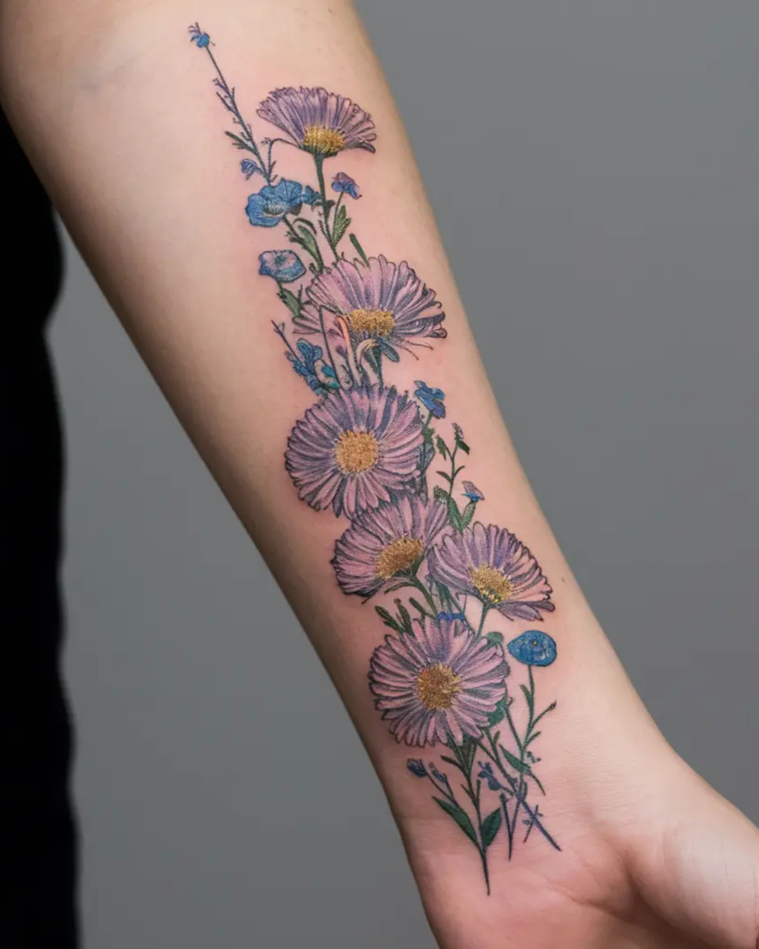 The Art and Meaning of Aster and Morning Glory Tattoos
