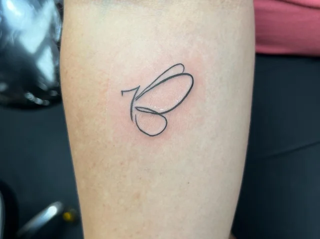 One-Line Butterfly Charm
