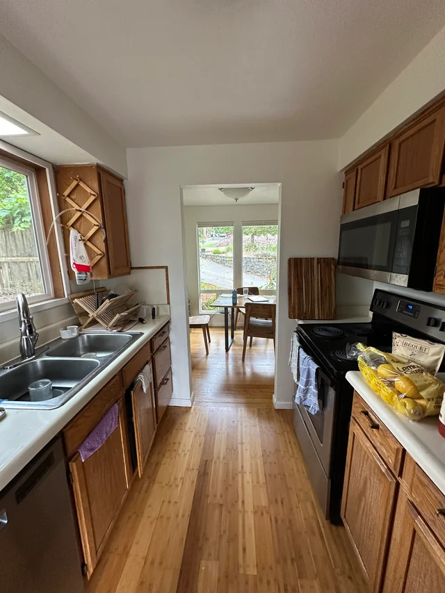 Cozy Galley Kitchen with Natural Light